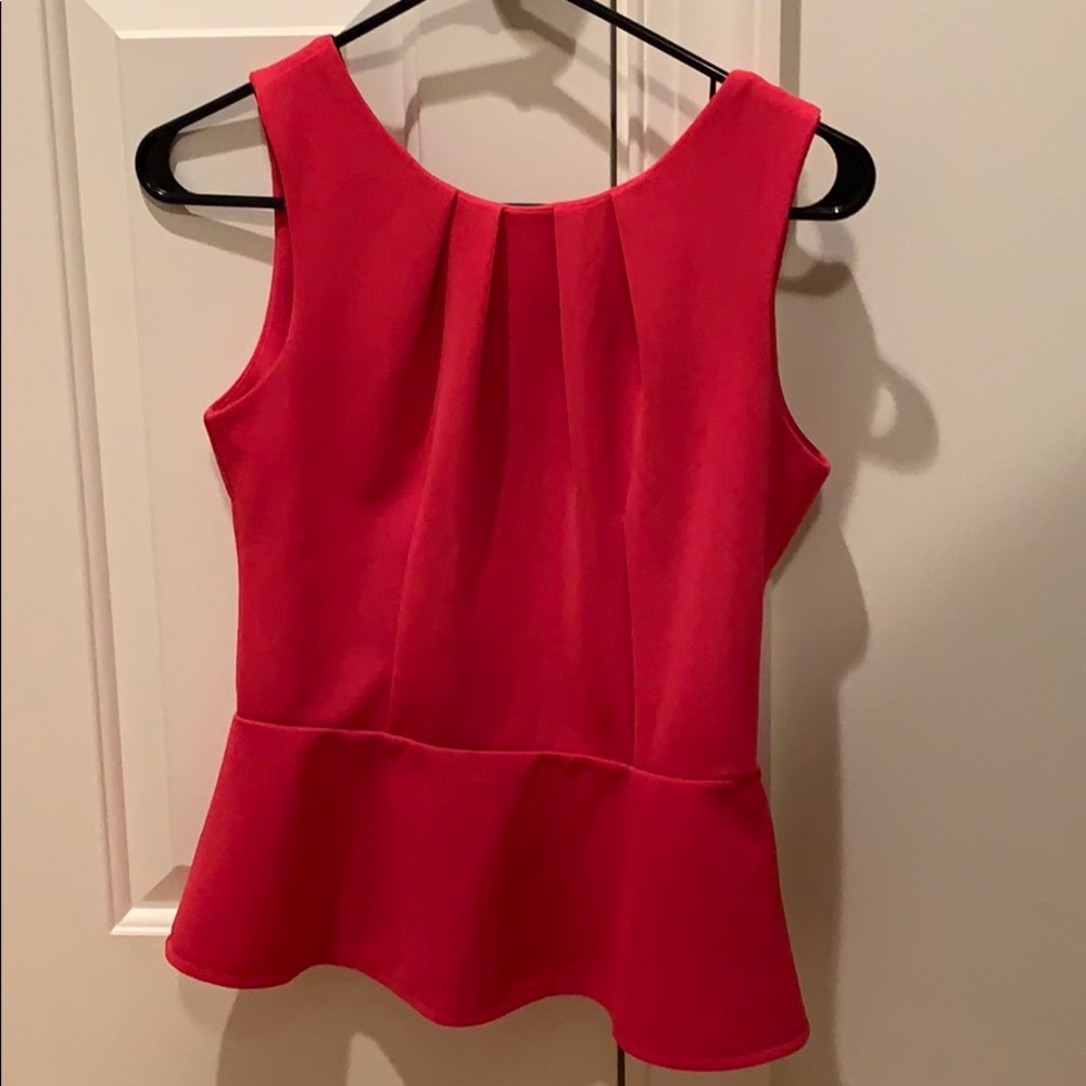 Pink Peplum Sleeveless Shirt